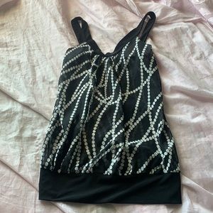 Black and white sheer sleeveless top
